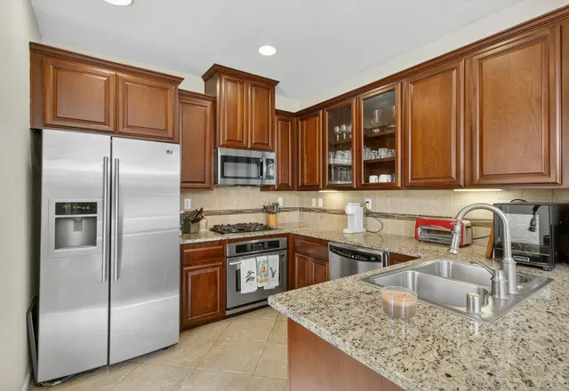 a view of a kitchen from the hallway