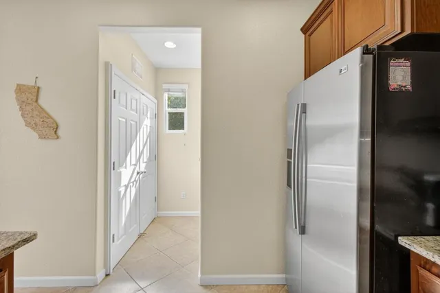 a bathroom with a sink vanity and a mirror