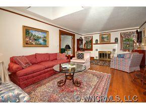 1964 County Road Lake Junaluska, NC 28745 - Photo 4 of 12 a living room with furniture a rug and a table