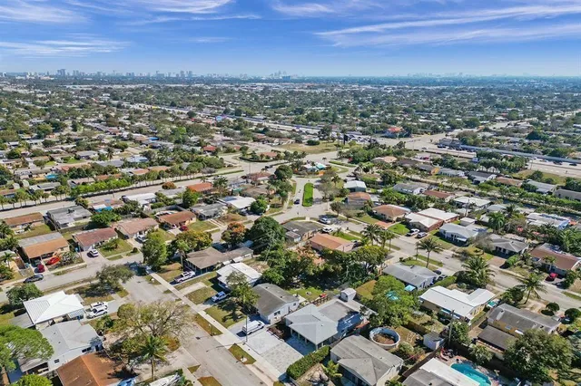 an aerial view of a city with lots of residential buildings