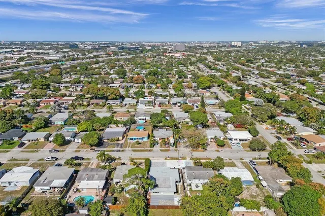 an aerial view of residential building with parking space