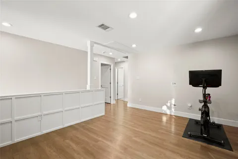 a view of a livingroom with wooden floor