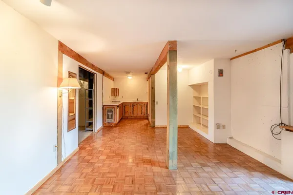 a view of an empty room and window