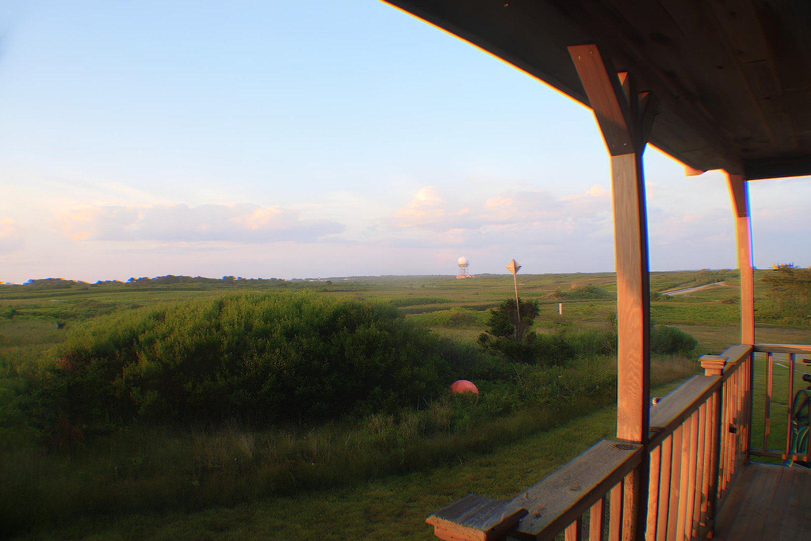 48 Madequecham Valley Road Nantucket, MA 02554 - Photo 15 of 20 a view of a lake from a balcony