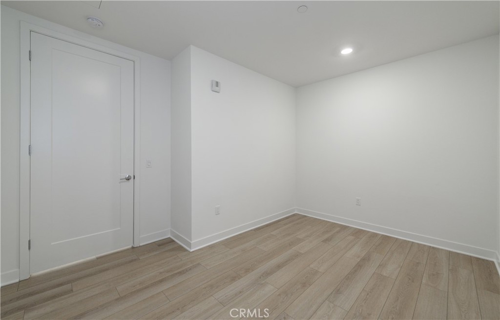 3608 Rivington Irvine, CA 92612 - Photo 37 of 74 a view of room with wooden floor
