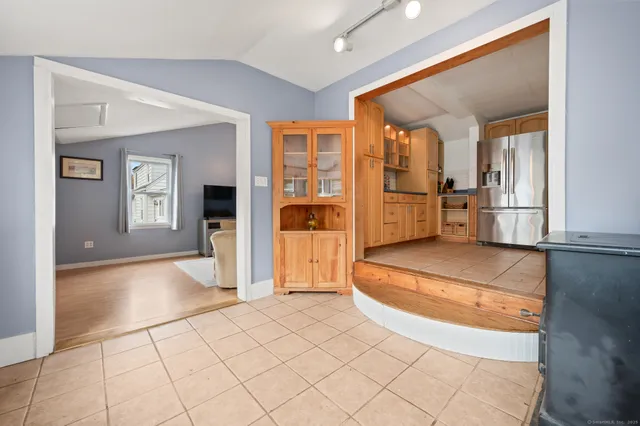 a spacious bathroom with a tub and shower