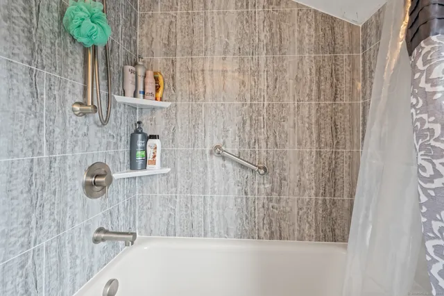 a bathroom with a bathtub