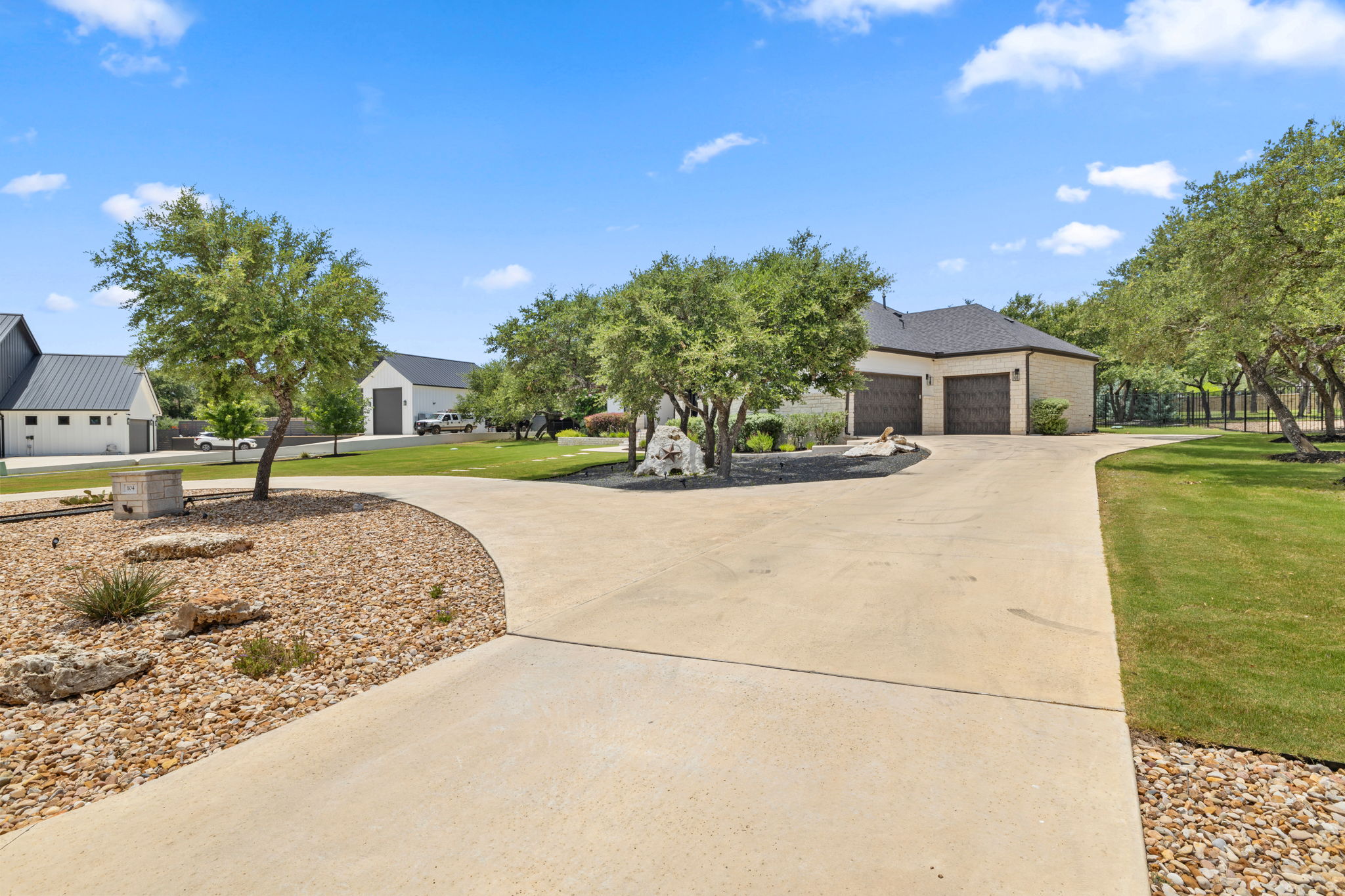 104 Lower Cedar Cove Georgetown, TX 78633 - Photo 31 of 37 a view of a house with a backyard