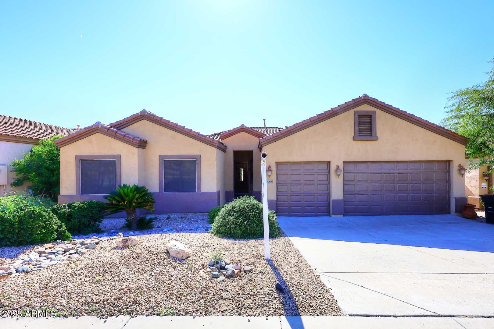 2007 East Topeka Drive Phoenix, AZ 85024 - Photo 1 of 34 a front view of a house with garden