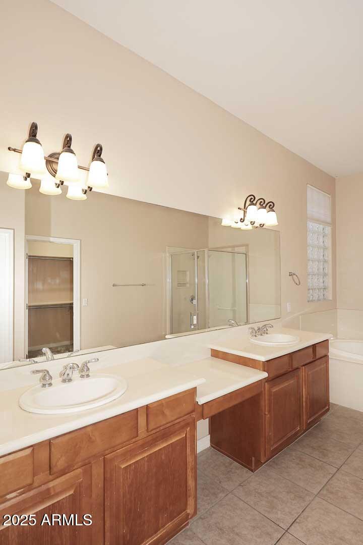 2007 East Topeka Drive Phoenix, AZ 85024 - Photo 16 of 34 a bathroom with a sink vanity granite and a mirror