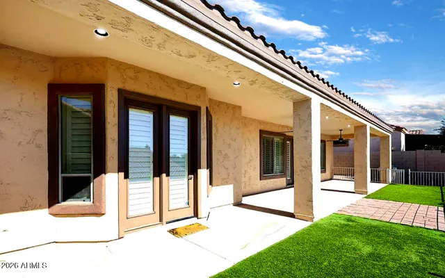 a view of an chair in front of house