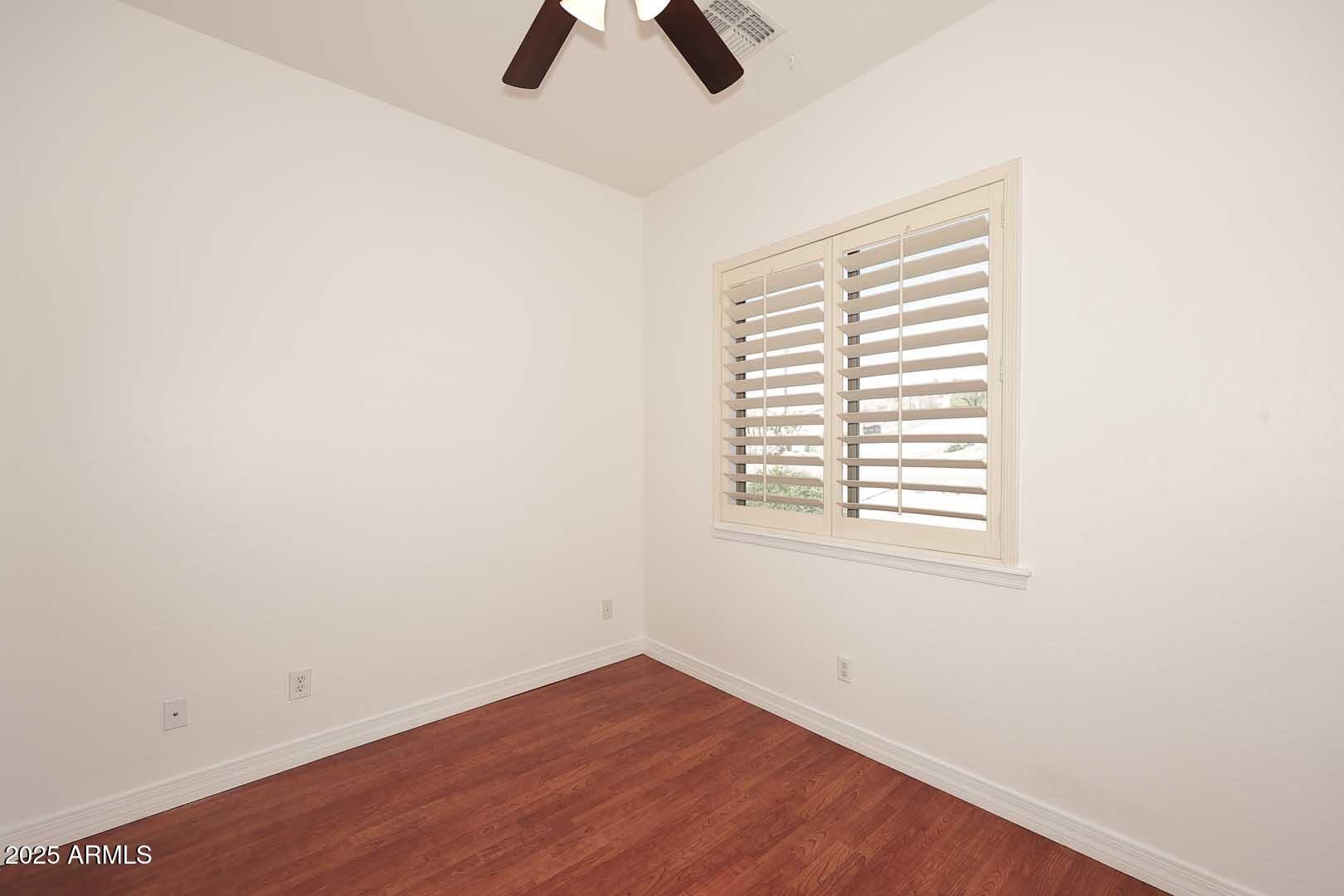 2007 East Topeka Drive Phoenix, AZ 85024 - Photo 26 of 34 an empty room with ceiling fan and window