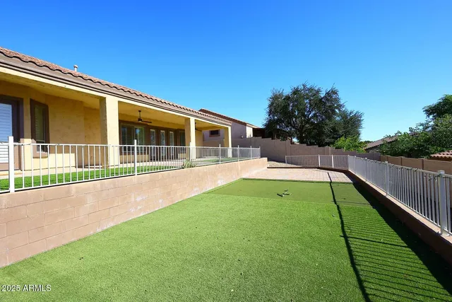 a view of backyard with wooden floor