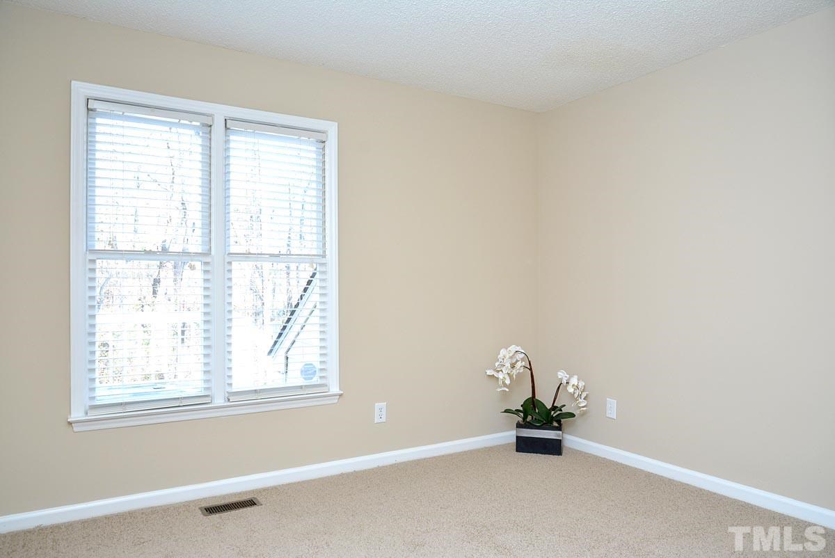 4517 Emmit Drive Raleigh, NC 27604 - Photo 14 of 25 an empty room with a window