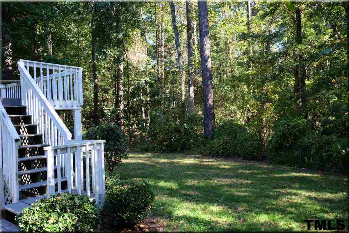4517 Emmit Drive Raleigh, NC 27604 - Photo 18 of 25 a view of deck and garden