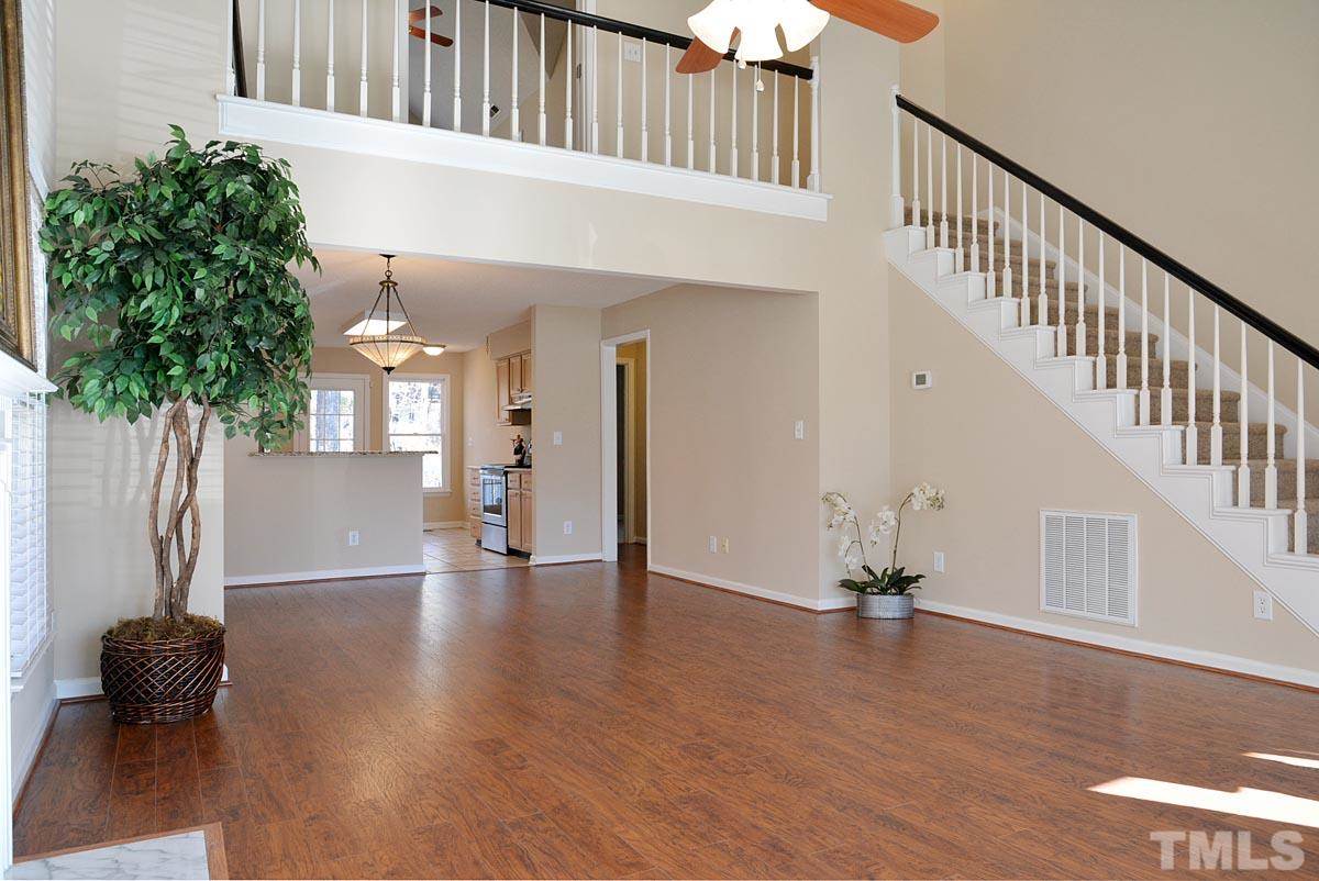 4517 Emmit Drive Raleigh, NC 27604 - Photo 4 of 25 a view of an entryway with wooden floor