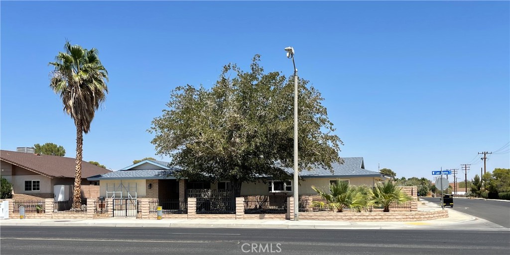 a view of a town with palm trees