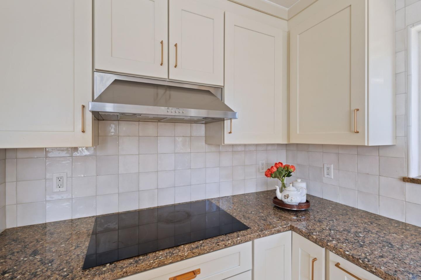3959 Purdue Way Livermore, CA 94550 - Photo 10 of 23 a kitchen with white cabinets and a sink