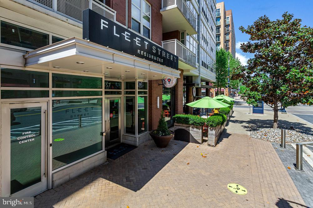 a view of a chairs and table in the patio
