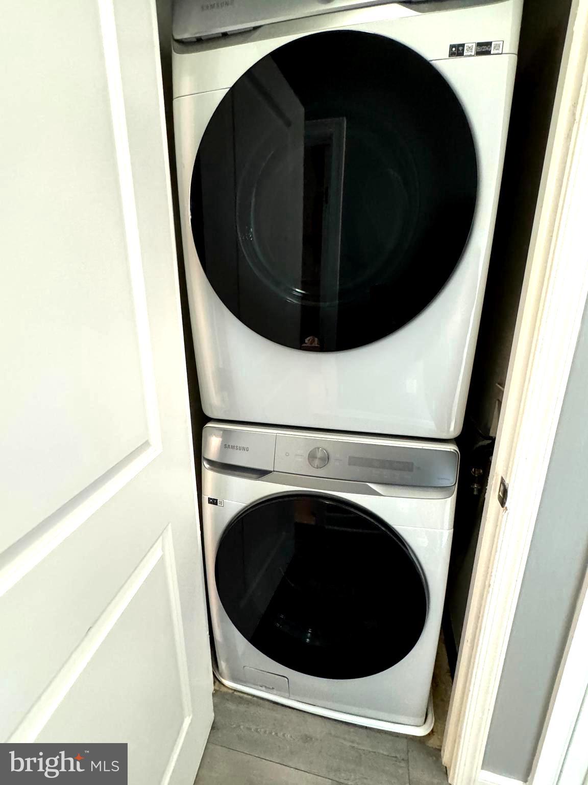 157 Fleet Street, Unit PH14 Oxon Hill, MD 20745 - Photo 15 of 27 a close up view of washer and dryer