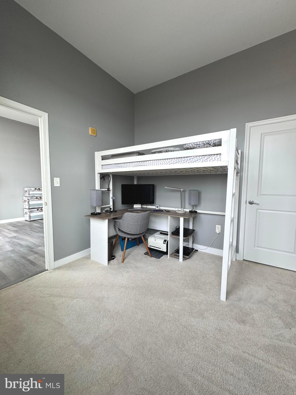 157 Fleet Street, Unit PH14 Oxon Hill, MD 20745 - Photo 16 of 27 a view of a livingroom with table and chairs