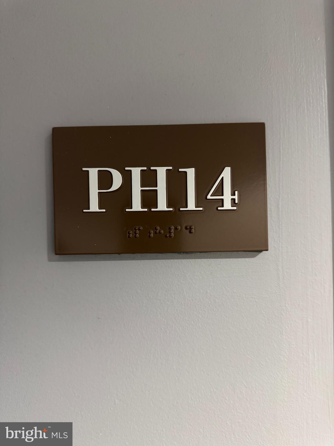 157 Fleet Street, Unit PH14 Oxon Hill, MD 20745 - Photo 2 of 27 a view of wooden door