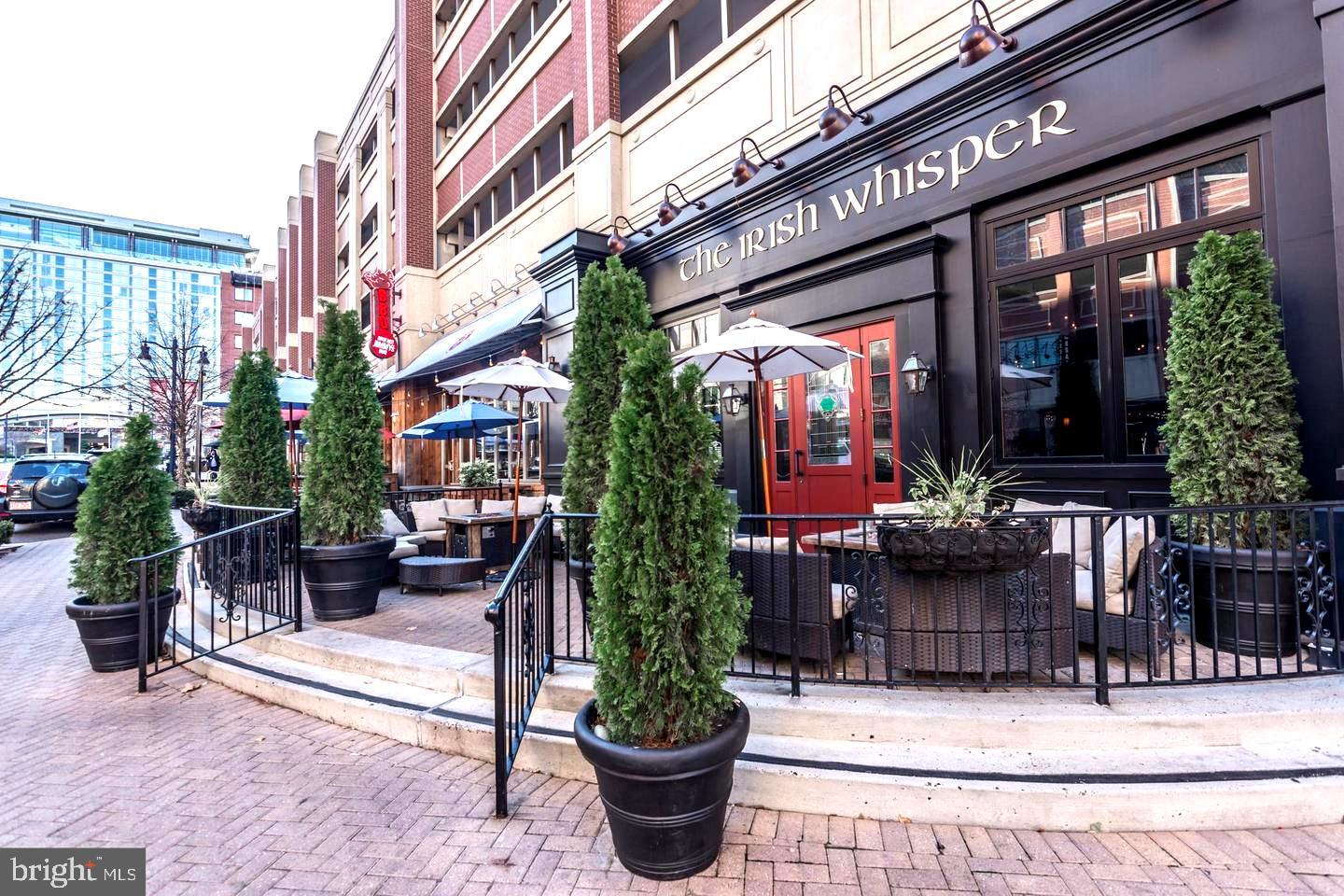 157 Fleet Street, Unit PH14 Oxon Hill, MD 20745 - Photo 25 of 27 a view of a building with sitting area