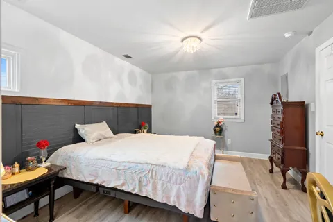 a white bath tub sitting next to a white sink