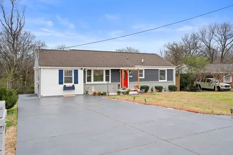 front view of a house with a patio