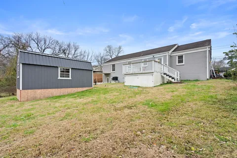 a house view with a garden space