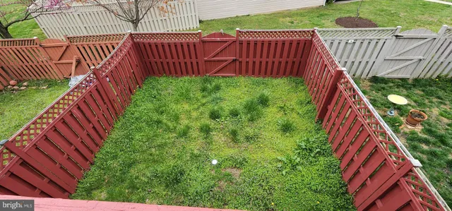 a view of stairs and a yard