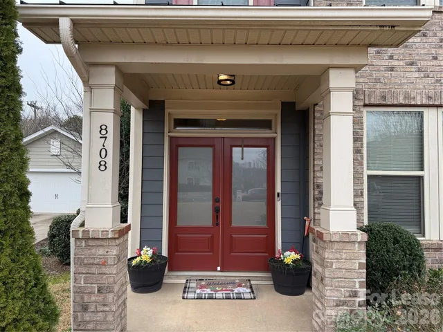 a view of entrance gate of the house