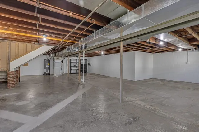 a view of a room with wooden walls