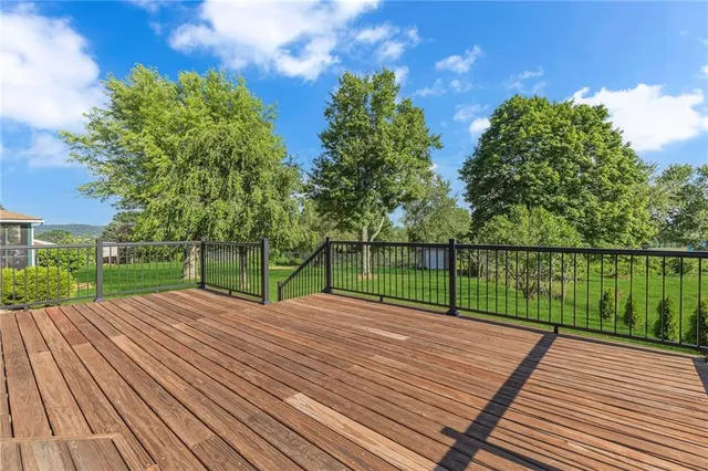 a view of wooden deck with a garden