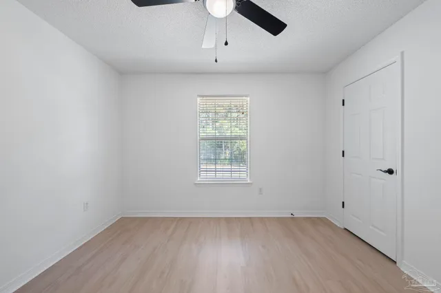 a bathroom with a sink toilet tub and shower