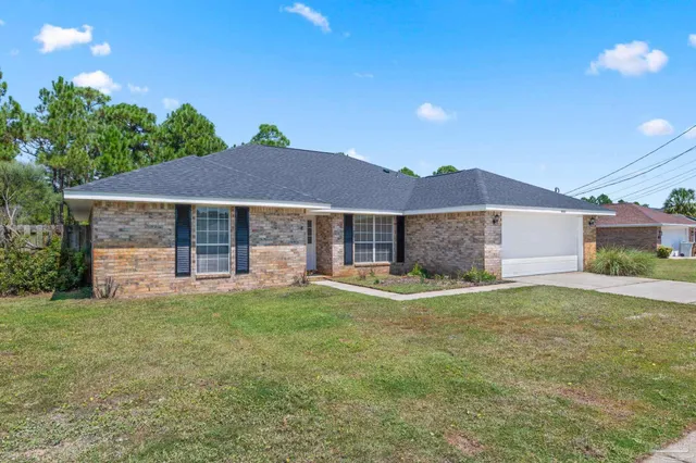a house view with a garden space