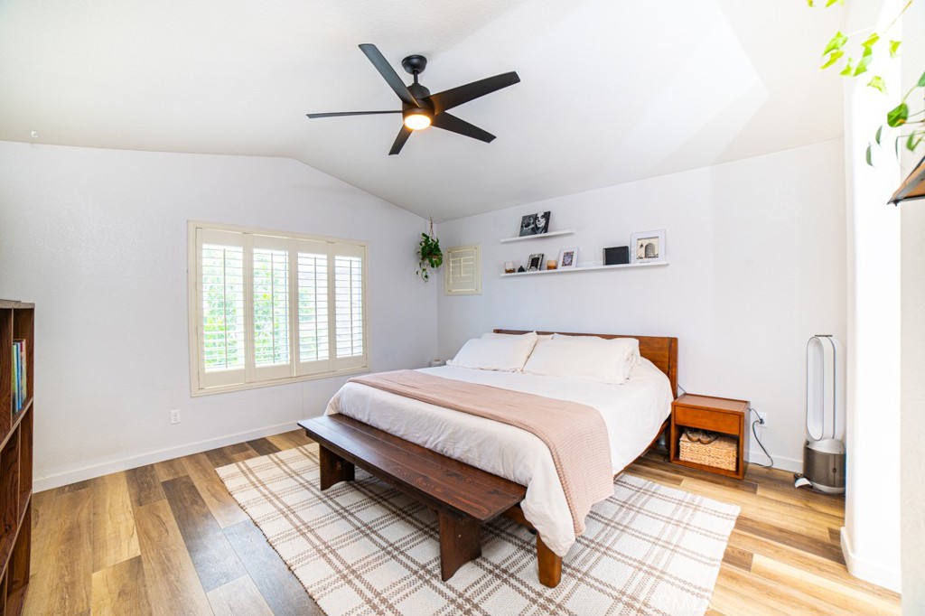 17801 Morning Rock Circle Riverside, CA 92503 - Photo 8 of 18 a bedroom with a bed and wooden floor