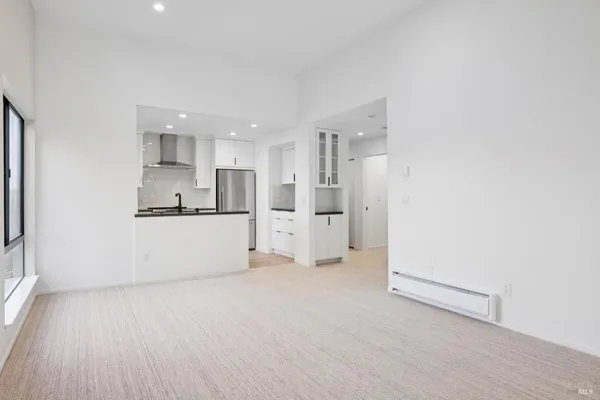 a view of kitchen with wooden floor
