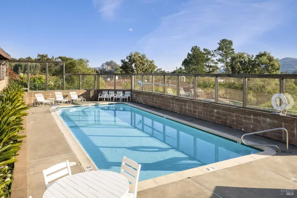 a view of a house with a swimming pool