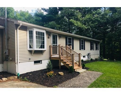 68 Breakneck Road Sturbridge, MA 01566 - Photo 1 of 13 a view of a house with a yard