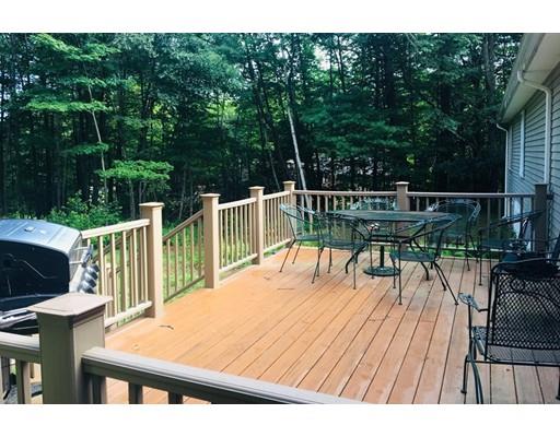68 Breakneck Road Sturbridge, MA 01566 - Photo 12 of 13 a view of a chairs and table on the deck