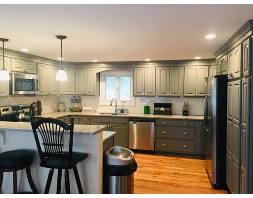 68 Breakneck Road Sturbridge, MA 01566 - Photo 3 of 13 a kitchen with stainless steel appliances granite countertop a stove top oven a sink dishwasher and a refrigerator