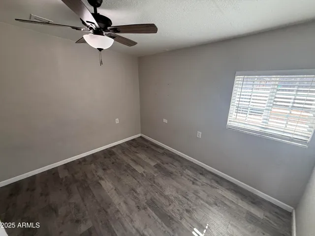 a view of empty room with a window