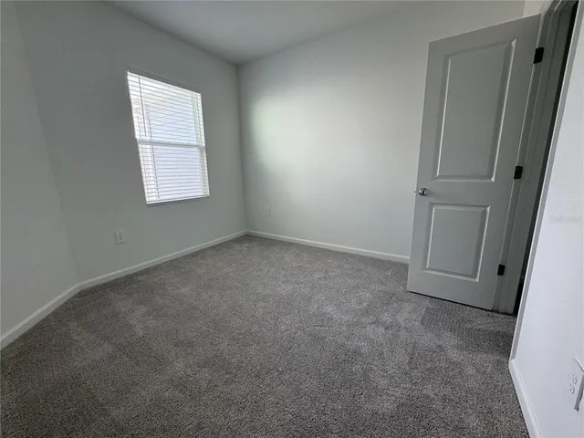 an empty room with closet