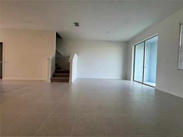 a view of workspace with window and tv