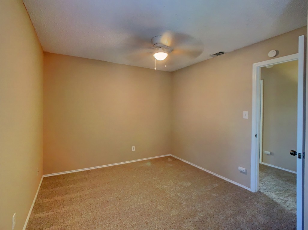 12705 Modena Trail Austin, TX 78729 - Photo 11 of 16 an empty room with a bathroom