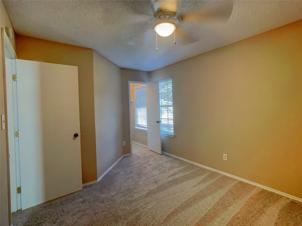 12705 Modena Trail Austin, TX 78729 - Photo 12 of 16 a view of an empty room