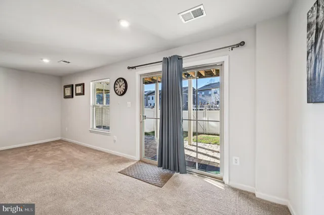 an empty room with closet area