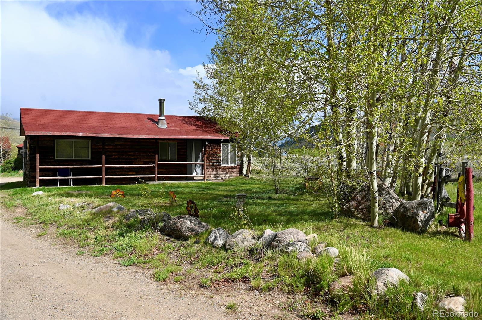 1516 Heeney Road Silverthorne, CO 80498 - Photo 2 of 16 a front view of a house with a yard