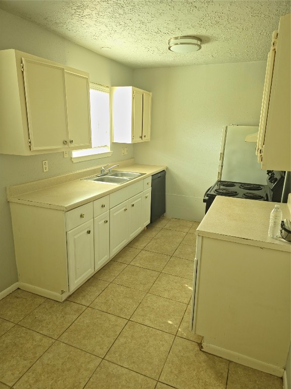 3202 Yale Street, Unit 6 Houston, TX 77018 - Photo 6 of 18 a utility room with a sink a washer and dryer